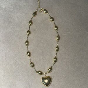 Puffy heart gold necklace of the summer !